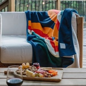 SOLD-Brand New Cozy Rumpl Blanket in Harvest Wave